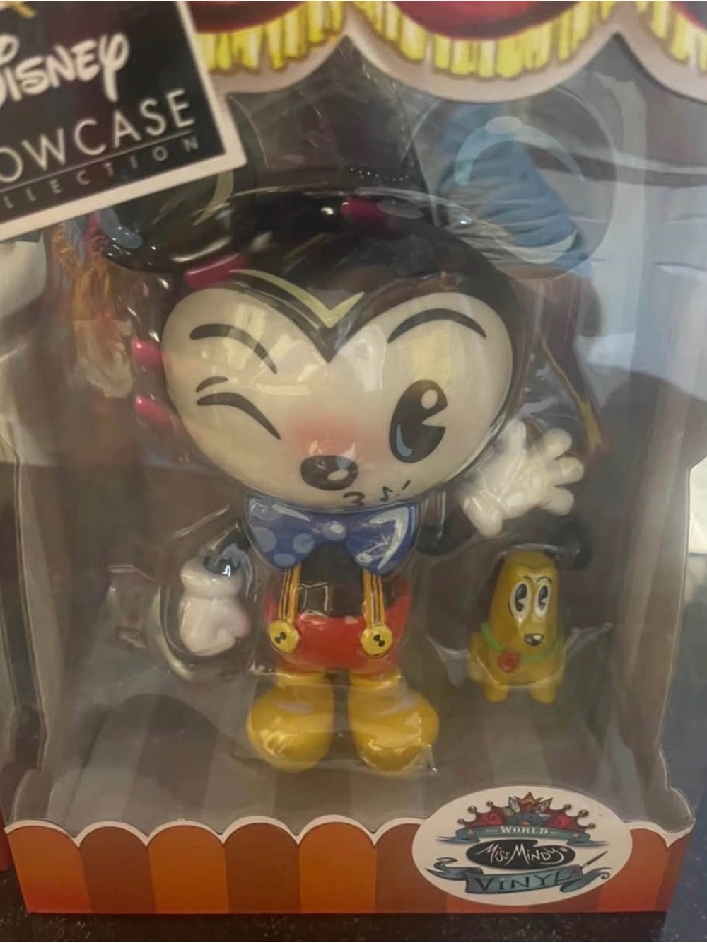 Disney showcase, Miss Mindy, Mickey Mouse, and Pluto figurine
